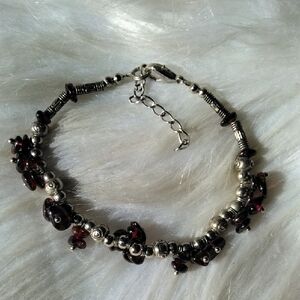 Silver-Tone Bracelet with Dark Red Bead Accents